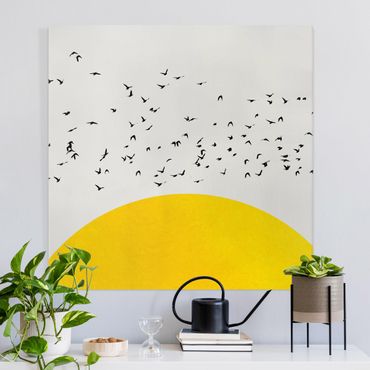 Obraz na płótnie - Stado ptaków na tle żółtego słońca