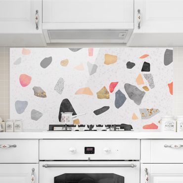 Panel szklany do kuchni - Białe lastryko z kamieniami w kolorze złotym