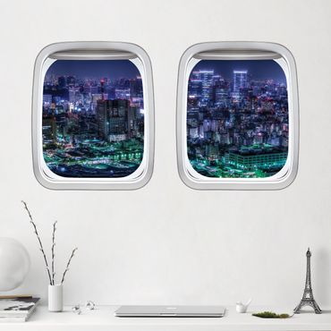 Naklejka na ścianę - Samolot z podwójnym oknem Tokio nocą
