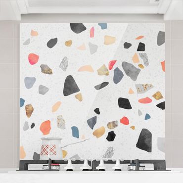Panel szklany do kuchni - Białe lastryko z kamieniami w kolorze złotym