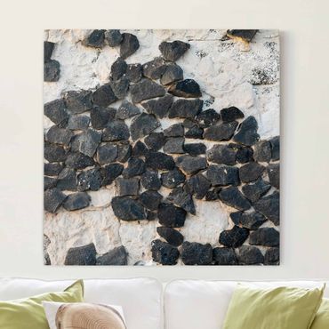 Obraz na płótnie - Ściana z czarnymi kamieniami