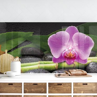 Panel ścienny do kuchni - Zielony bambus z kwiatem orchidei