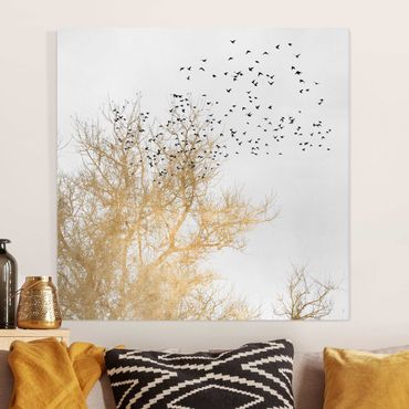 Obraz na płótnie - Stado ptaków na tle złotego drzewa