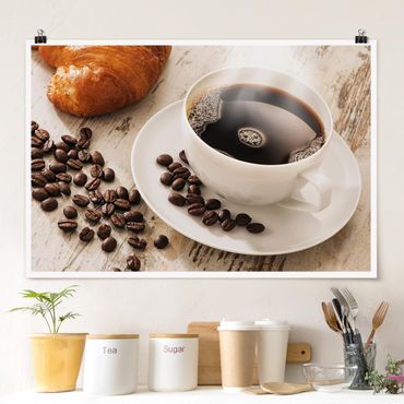 Plakat - Parująca filiżanka do kawy z ziarnami kawy