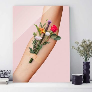 Obraz na szkle - Ręka z kwiatami