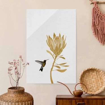 Obraz na szkle - Koliber i tropikalny złoty kwiat