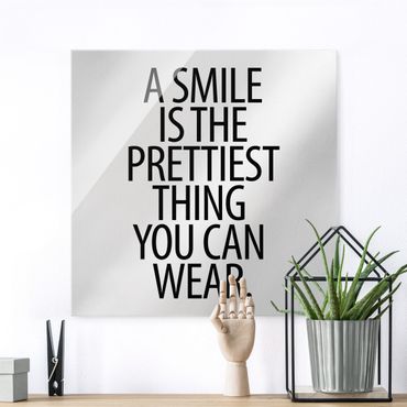 Obraz na szkle - Uśmiech to najładniejsza rzecz Sans Serif