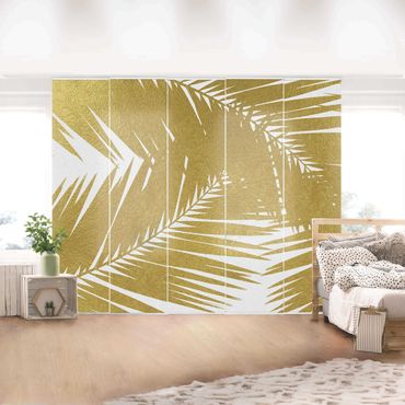 Zasłony panelowe zestaw - Widok przez złote liście palmy