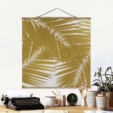 Plakat z wieszakiem - Widok przez złote liście palmy