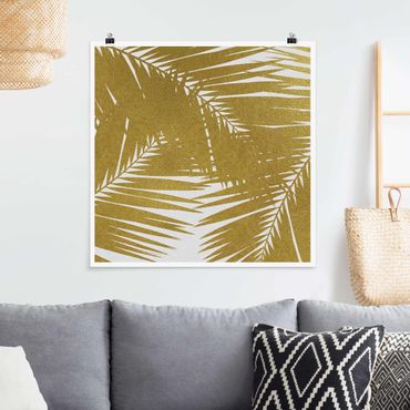 Plakat - Widok przez złote liście palmy