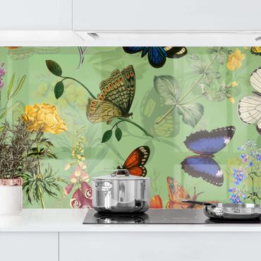 Panel ścienny do kuchni - Motylki z kwiatami na zielonym tle