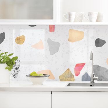 Panel ścienny do kuchni - Białe lastryko z kamieniami w kolorze złotym