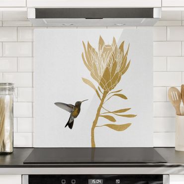 Panel szklany do kuchni - Koliber i tropikalny złoty kwiat