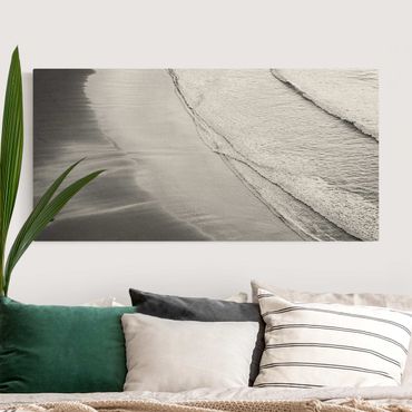 Obraz na naturalnym płótnie - Lekki wiatr na plaży czarno-biały