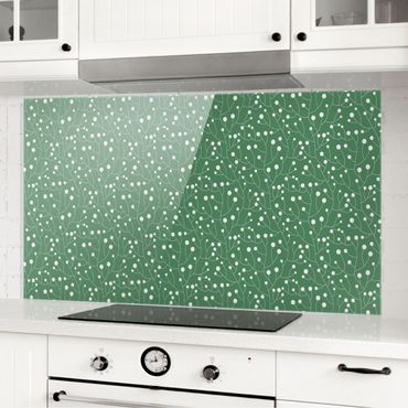Panel szklany do kuchni - Naturalny wzrost wzoru z kropkami na zielonym tle