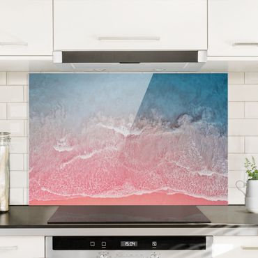 Panel szklany do kuchni - Ocean w kolorze różowym