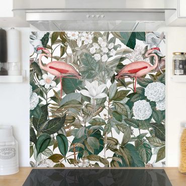 Panel szklany do kuchni - Różowe flamingi z liśćmi i białymi kwiatami