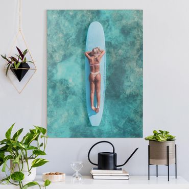 Obraz na płótnie - Surfer Girl With Blue Board - Format pionowy 3:4