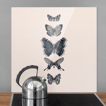 Panel szklany do kuchni - Motyle z atramentu na beżowym tle