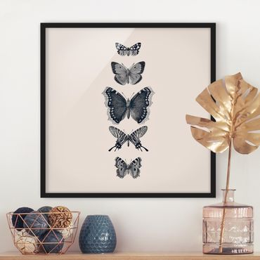 Plakat w ramie - Motyle z atramentu na beżowym tle