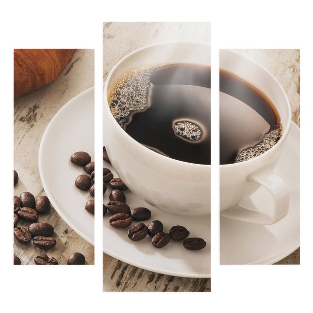 Obrazy drukowane na płótnie Parująca filiżanka do kawy z ziarnami kawy
