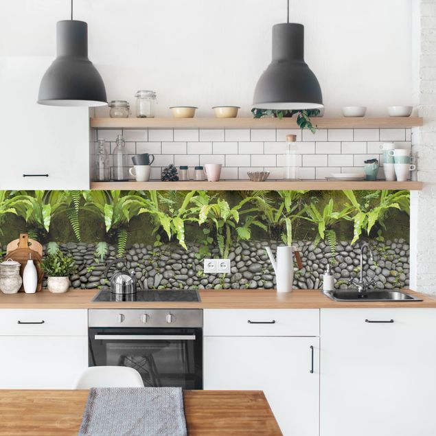 Panele szklane do kuchni Kamienny mur z roślinami