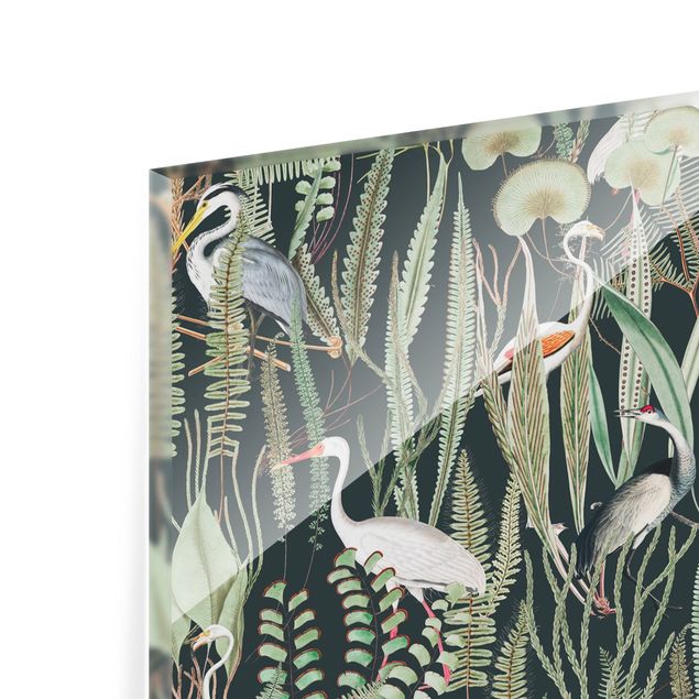 Panel szklany do kuchni - Flamingi i bociany z roślinami na zielonym tle