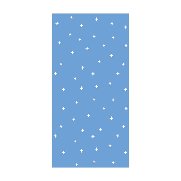 dywany nowoczesne Narysowane białe krzyże na niebieskim tle