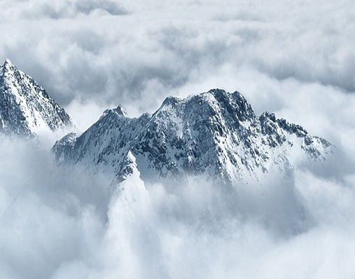 Naklejki na płytki Alpy ponad chmurami