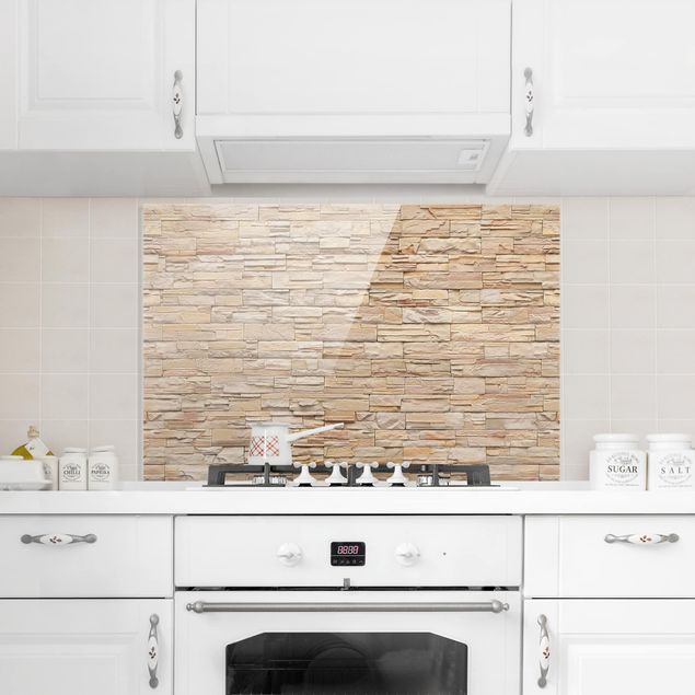 Panele szklane do kuchni Asian Kamienna ściana- duży, jasny kamienny mur z domowych kamieni