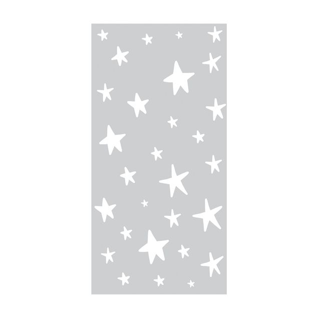 dywan nowoczesny Narysowane duże gwiazdy na szarym niebie