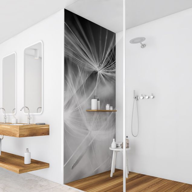Panele ścienne do łazienki pod prysznic Moving Dandelions Close Up On Black Background