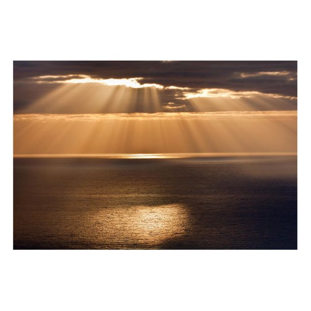 Obrazy do salonu nowoczesne Promienie słońca nad morzem