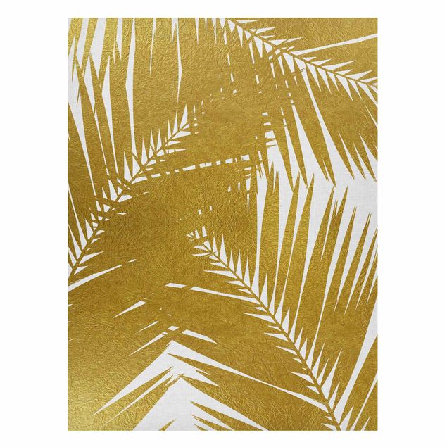 Obrazy do salonu nowoczesne Widok przez złote liście palmy