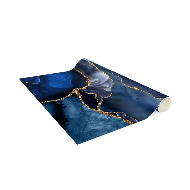 dywan nowoczesny Złote fale brokatu na tle błękitu