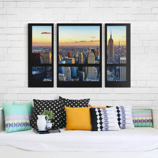 Obrazy do salonu nowoczesne Widok z okna - wschód słońca w Nowym Jorku
