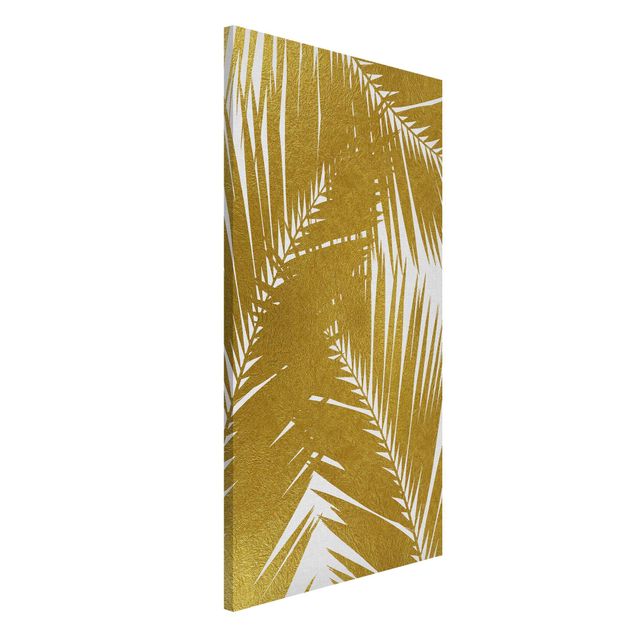 Dekoracja do kuchni Widok przez złote liście palmy