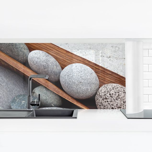 Panel szklany do kuchni Nieruchome życie z szarymi kamieniami