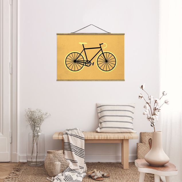 Nowoczesne obrazy do salonu Rower w kolorze żółtym