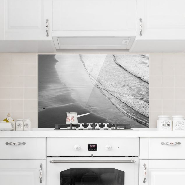 Panel szklany do kuchni Lekki wiatr na plaży czarno-biały