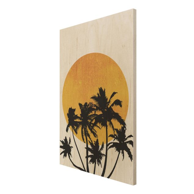 Obrazy na drewnie Palmy na tle złotego słońca