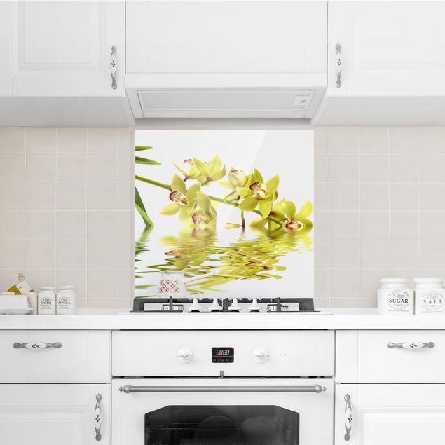 Panele szklane do kuchni Eleganckie wody orchidei