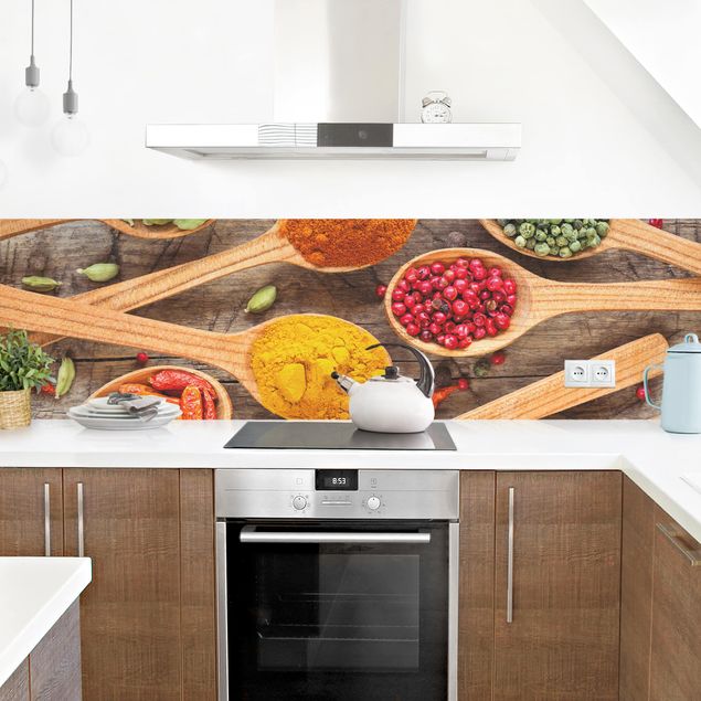 Panel szklany do kuchni Przyprawy na drewnianej łyżce