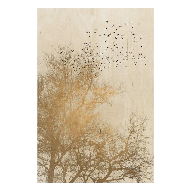 Obrazy na ścianę Stado ptaków na tle złotego drzewa