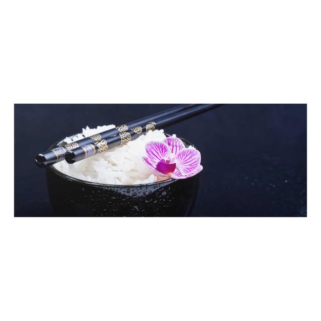 Obraz czarny Miska na ryż z orchideą