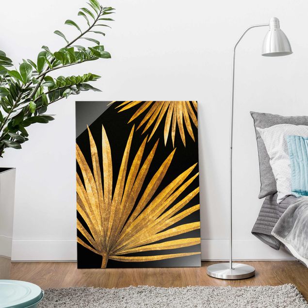 Obrazy na szkle portret Złoto - liść palmy na czarnym tle