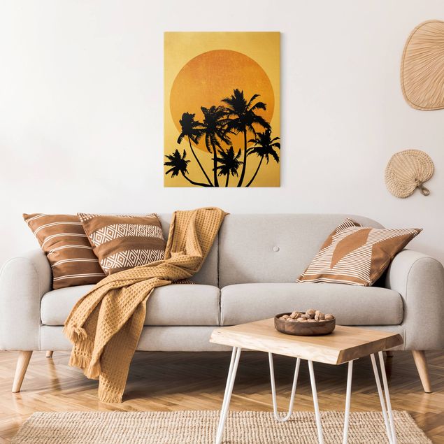 Obrazy do salonu nowoczesne Palmy na tle złotego słońca