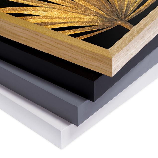 Obrazy do salonu nowoczesne Złoto - liść palmy na czarnym tle