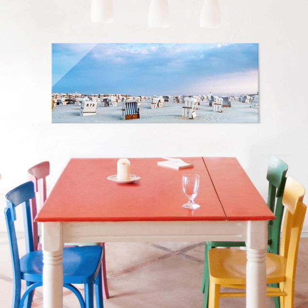 Obrazy na szkle panorama Krzesła plażowe nad Morzem Północnym