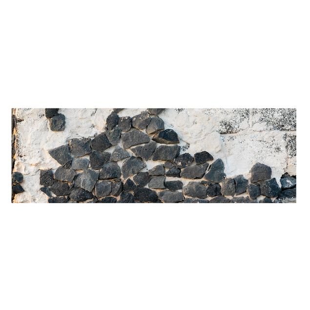 Artystyczne obrazy Ściana z czarnymi kamieniami